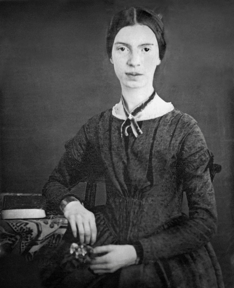 Black and white photograph of Emily Dickinson. 