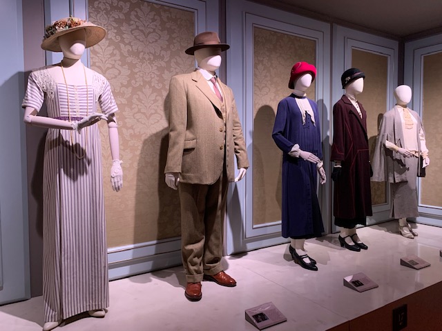 Downton Abbey costumes on display at an exhibition. 