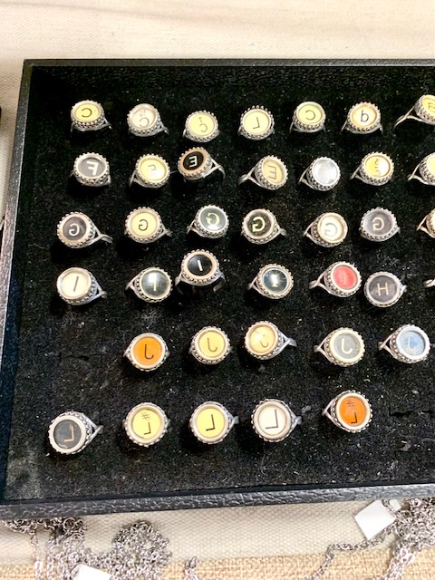 Fashion rings made out of typewriter keys. 