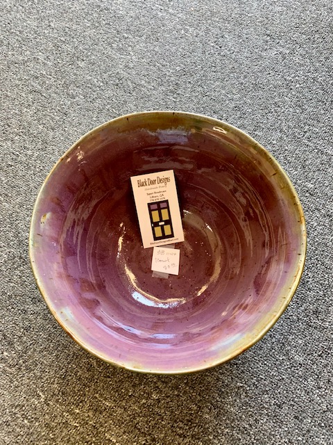 Purple hued pottery bowl. 