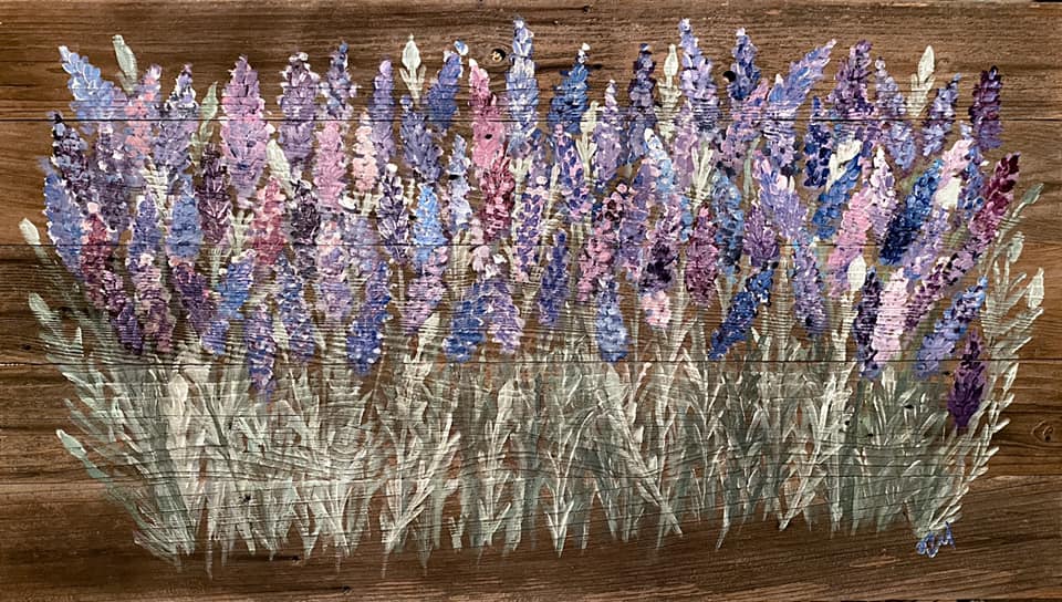 Lavendar floweres painted on a wooden board as decoraton. 